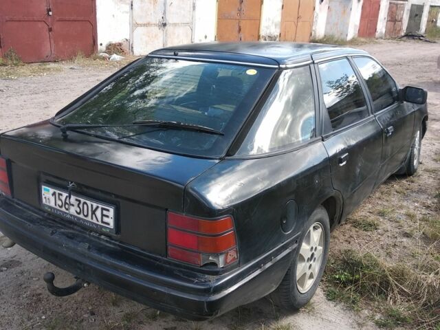 Черный Форд Скорпио, объемом двигателя 2 л и пробегом 302 тыс. км за 900 $, фото 4 на Automoto.ua