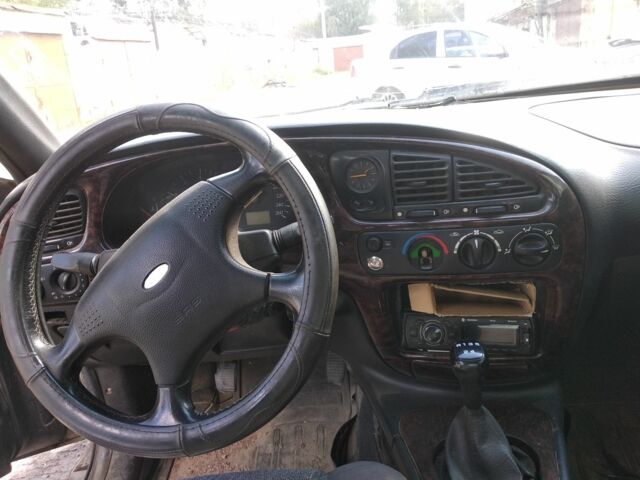 Черный Форд Скорпио, объемом двигателя 2 л и пробегом 302 тыс. км за 900 $, фото 5 на Automoto.ua