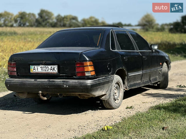 Черный Форд Скорпио, объемом двигателя 2 л и пробегом 320 тыс. км за 550 $, фото 4 на Automoto.ua