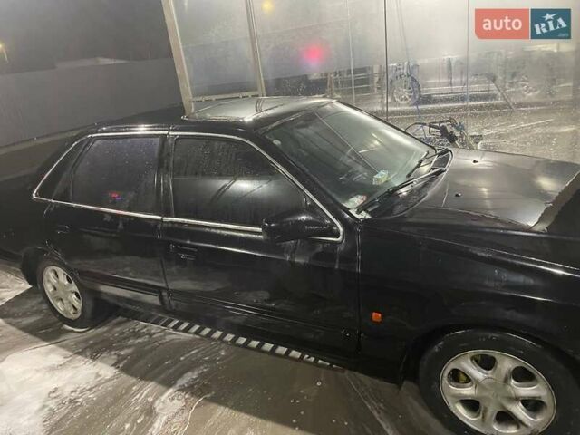 Черный Форд Скорпио, объемом двигателя 2 л и пробегом 200 тыс. км за 1550 $, фото 2 на Automoto.ua