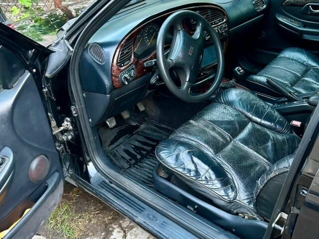 Чорний Форд Скорпіо, об'ємом двигуна 2 л та пробігом 340 тис. км за 1499 $, фото 4 на Automoto.ua