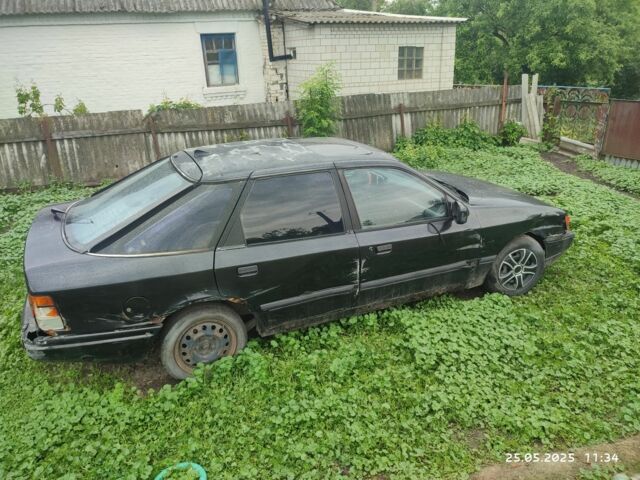 Черный Форд Скорпио, объемом двигателя 2 л и пробегом 2 тыс. км за 549 $, фото 1 на Automoto.ua