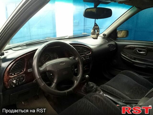 Фіолетовий Форд Скорпіо, об'ємом двигуна 2 л та пробігом 350 тис. км за 1400 $, фото 4 на Automoto.ua