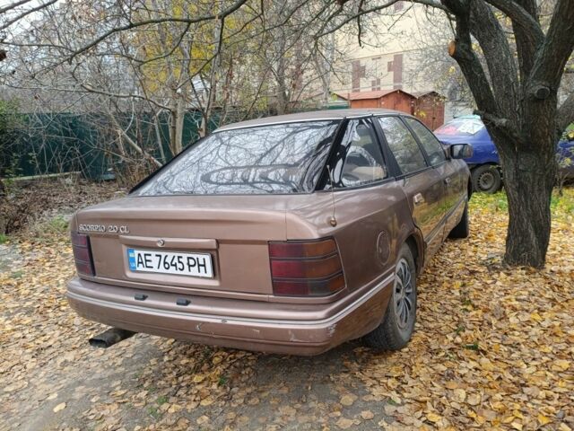 Коричневий Форд Скорпіо, об'ємом двигуна 2 л та пробігом 256 тис. км за 406 $, фото 4 на Automoto.ua