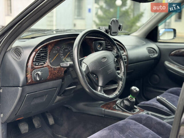 Коричневий Форд Скорпіо, об'ємом двигуна 2 л та пробігом 250 тис. км за 2499 $, фото 18 на Automoto.ua