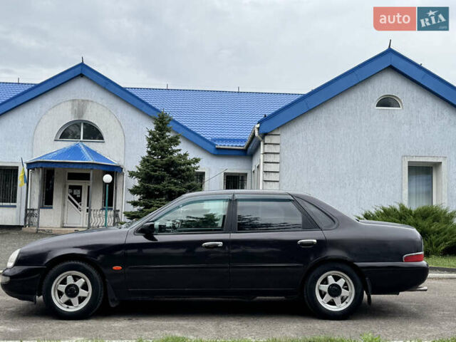 Коричневий Форд Скорпіо, об'ємом двигуна 2 л та пробігом 250 тис. км за 2499 $, фото 14 на Automoto.ua