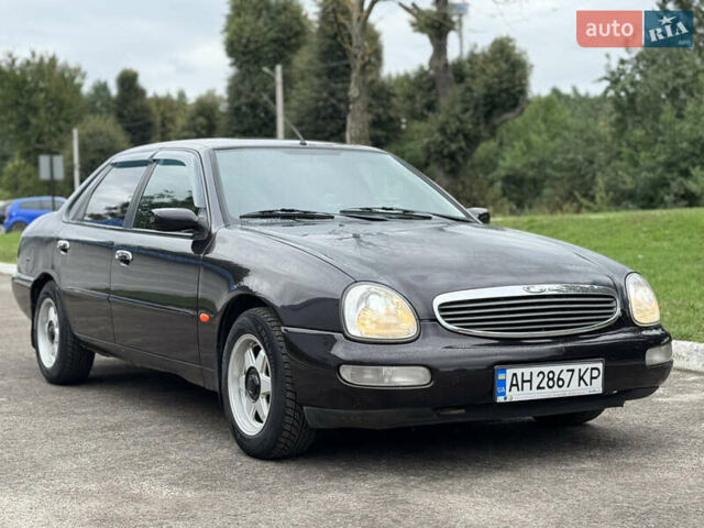 Коричневий Форд Скорпіо, об'ємом двигуна 2 л та пробігом 250 тис. км за 2499 $, фото 7 на Automoto.ua