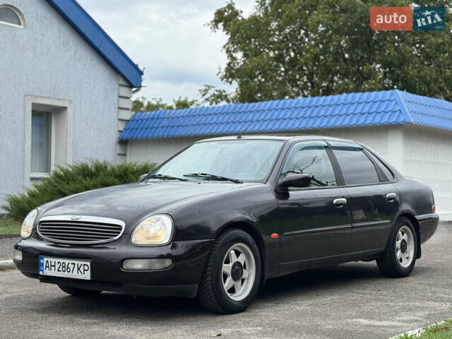 Коричневий Форд Скорпіо, об'ємом двигуна 2 л та пробігом 250 тис. км за 2499 $, фото 2 на Automoto.ua