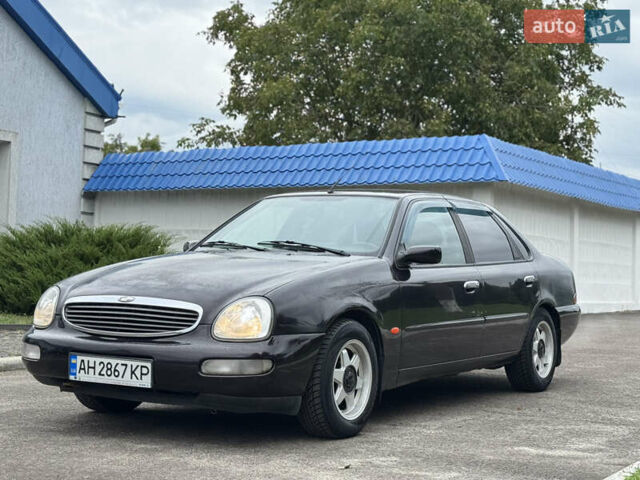 Коричневий Форд Скорпіо, об'ємом двигуна 2 л та пробігом 250 тис. км за 2499 $, фото 1 на Automoto.ua