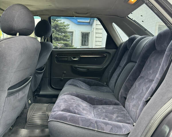 Коричневий Форд Скорпіо, об'ємом двигуна 2 л та пробігом 250 тис. км за 2499 $, фото 20 на Automoto.ua