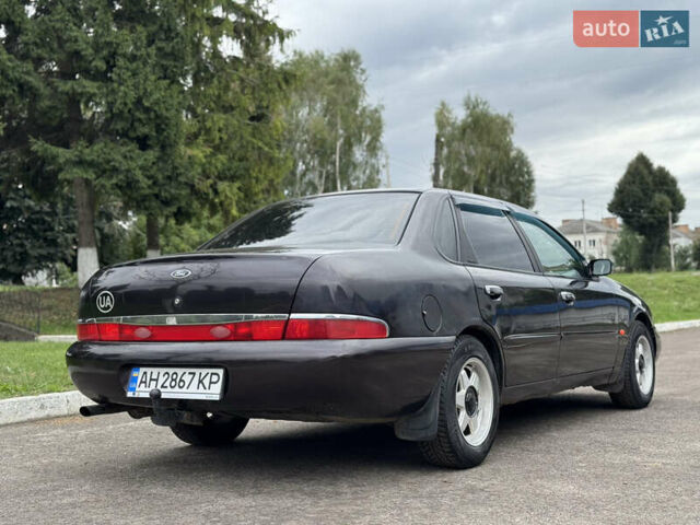 Коричневий Форд Скорпіо, об'ємом двигуна 2 л та пробігом 250 тис. км за 2499 $, фото 10 на Automoto.ua