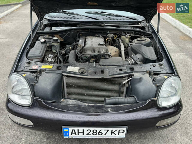 Коричневий Форд Скорпіо, об'ємом двигуна 2 л та пробігом 250 тис. км за 2499 $, фото 17 на Automoto.ua