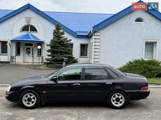 Коричневий Форд Скорпіо, об'ємом двигуна 2 л та пробігом 250 тис. км за 2499 $, фото 13 на Automoto.ua