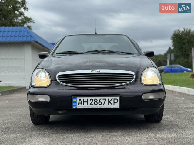 Коричневий Форд Скорпіо, об'ємом двигуна 2 л та пробігом 250 тис. км за 2499 $, фото 5 на Automoto.ua