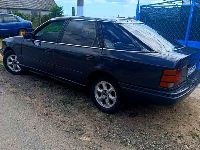 Форд Скорпио, объемом двигателя 2 л и пробегом 300 тыс. км за 810 $, фото 2 на Automoto.ua