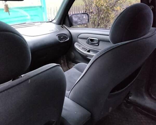 Сірий Форд Скорпіо, об'ємом двигуна 2 л та пробігом 400 тис. км за 1000 $, фото 2 на Automoto.ua