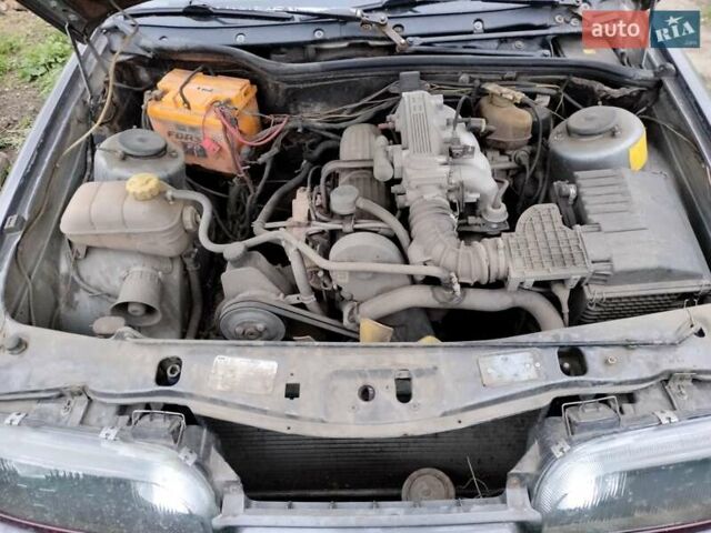 Сірий Форд Скорпіо, об'ємом двигуна 2 л та пробігом 400 тис. км за 1000 $, фото 1 на Automoto.ua