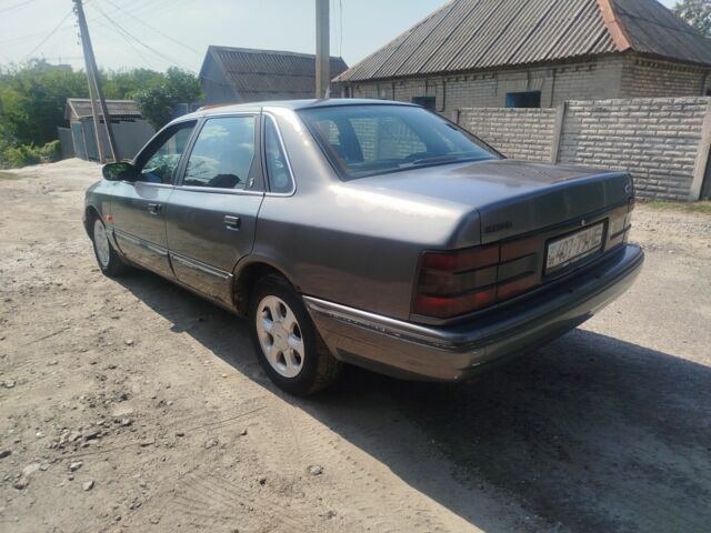 Сірий Форд Скорпіо, об'ємом двигуна 2 л та пробігом 100 тис. км за 1250 $, фото 3 на Automoto.ua