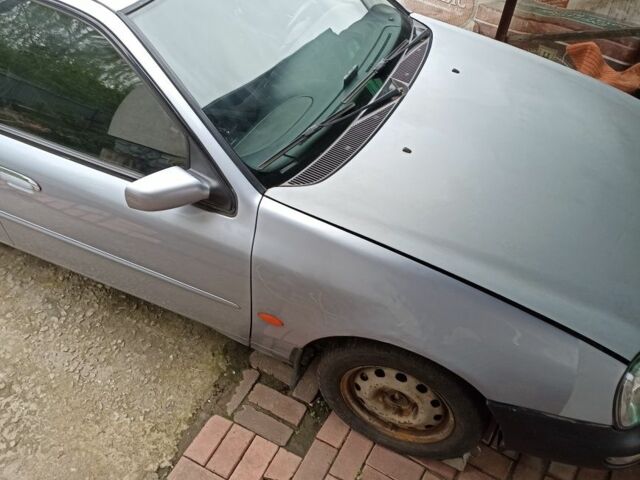 Серый Форд Скорпио, объемом двигателя 2.93 л и пробегом 240 тыс. км за 900 $, фото 1 на Automoto.ua