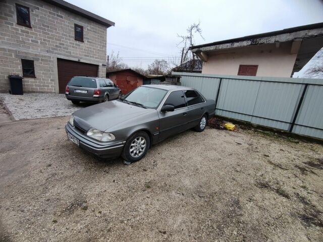 Серый Форд Скорпио, объемом двигателя 2 л и пробегом 240 тыс. км за 900 $, фото 1 на Automoto.ua