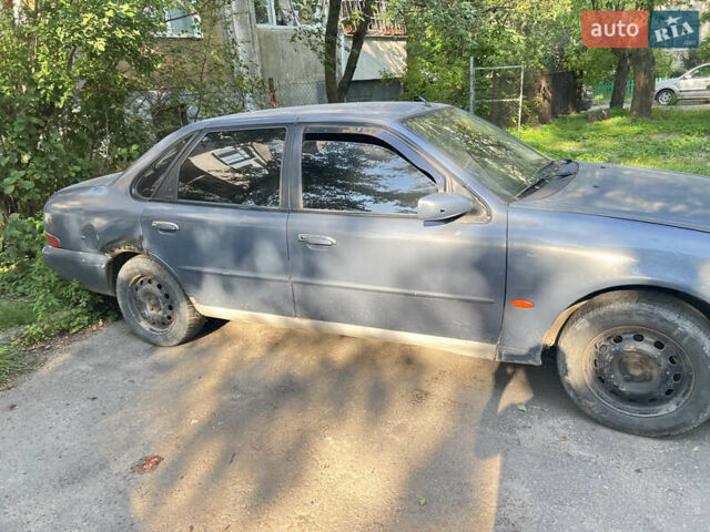 Сірий Форд Скорпіо, об'ємом двигуна 2 л та пробігом 350 тис. км за 1050 $, фото 2 на Automoto.ua