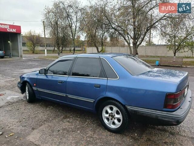 Форд Скорпіо 1990 у Зенькове на Automoto.ua Синій Форд Скорпіо, об'ємом двигуна 2 л та пробігом 308 тис. км за 2000 $, фото 5 на Automoto.ua