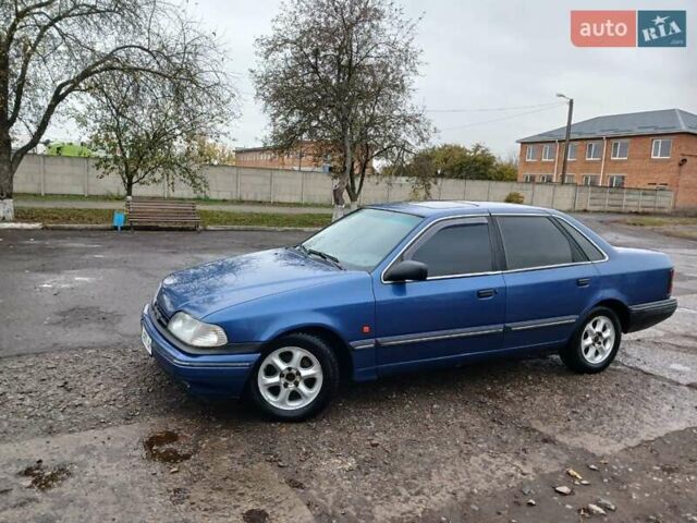 Форд Скорпіо 1990 у Зенькове на Automoto.ua Синій Форд Скорпіо, об'ємом двигуна 2 л та пробігом 308 тис. км за 2000 $, фото 10 на Automoto.ua