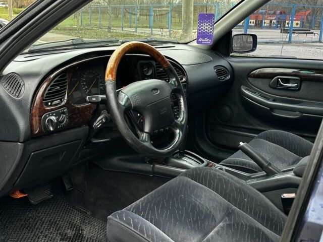 Синій Форд Скорпіо, об'ємом двигуна 2.3 л та пробігом 250 тис. км за 1650 $, фото 7 на Automoto.ua