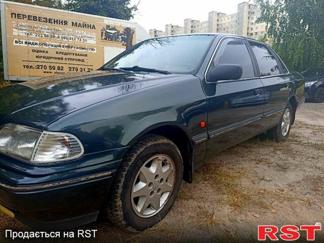 Зеленый Форд Скорпио, объемом двигателя 2 л и пробегом 300 тыс. км за 1800 $, фото 10 на Automoto.ua