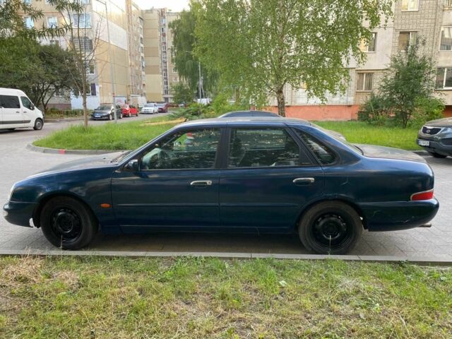 Зеленый Форд Скорпио, объемом двигателя 2 л и пробегом 238 тыс. км за 1300 $, фото 1 на Automoto.ua