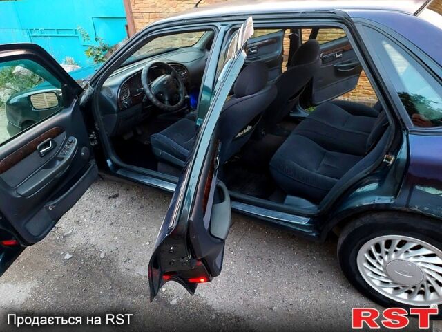 Зеленый Форд Скорпио, объемом двигателя 2 л и пробегом 260 тыс. км за 1500 $, фото 4 на Automoto.ua
