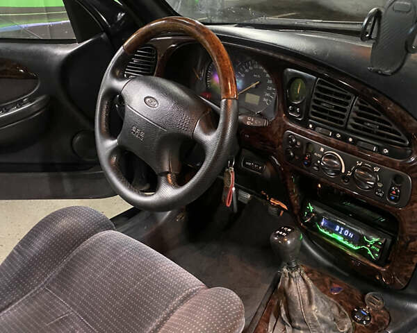 Зелений Форд Скорпіо, об'ємом двигуна 2.3 л та пробігом 333 тис. км за 2190 $, фото 26 на Automoto.ua