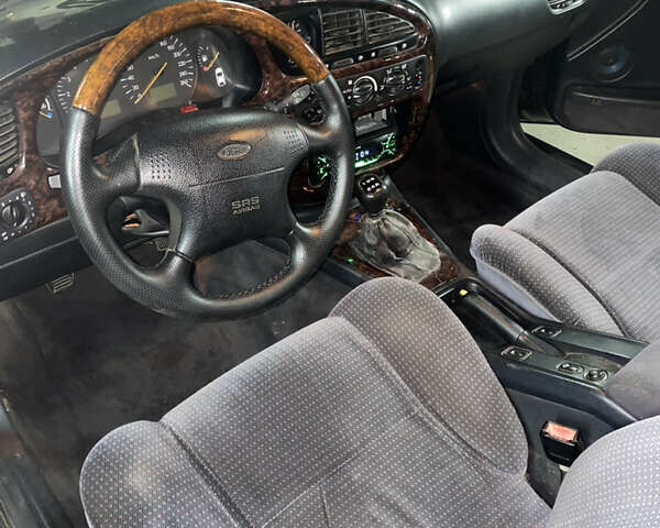 Зелений Форд Скорпіо, об'ємом двигуна 2.3 л та пробігом 333 тис. км за 2190 $, фото 11 на Automoto.ua