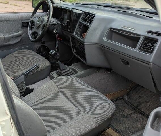 Белый Форд Сиерра, объемом двигателя 2.3 л и пробегом 800 тыс. км за 900 $, фото 7 на Automoto.ua