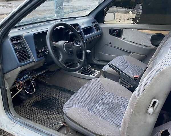 Белый Форд Сиерра, объемом двигателя 2 л и пробегом 777 тыс. км за 650 $, фото 3 на Automoto.ua