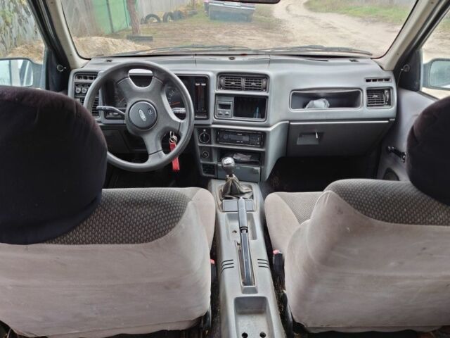 Белый Форд Сиерра, объемом двигателя 2 л и пробегом 100 тыс. км за 550 $, фото 7 на Automoto.ua