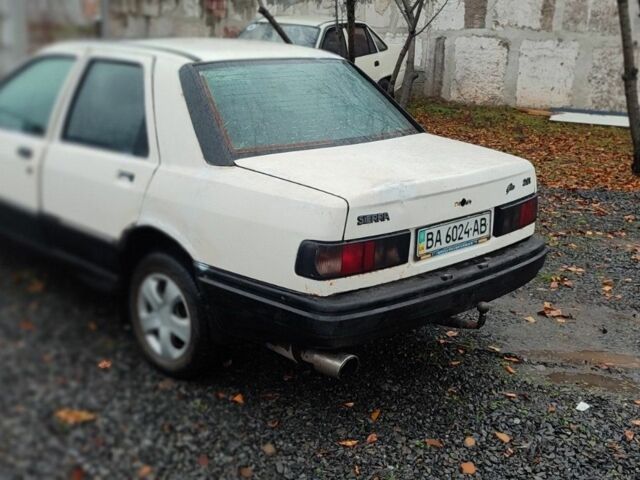 Белый Форд Сиерра, объемом двигателя 2 л и пробегом 250 тыс. км за 800 $, фото 3 на Automoto.ua