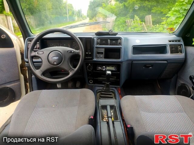 Белый Форд Сиерра, объемом двигателя 2 л и пробегом 350 тыс. км за 350 $, фото 3 на Automoto.ua