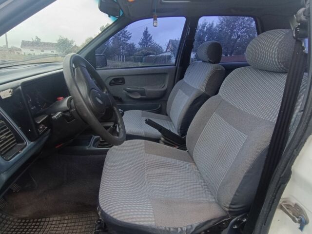 Белый Форд Сиерра, объемом двигателя 1.8 л и пробегом 330 тыс. км за 900 $, фото 7 на Automoto.ua