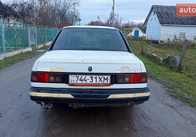 Белый Форд Сиерра, объемом двигателя 2 л и пробегом 300 тыс. км за 650 $, фото 4 на Automoto.ua