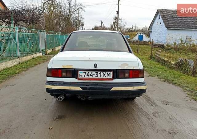 Білий Форд Сієрра, об'ємом двигуна 2 л та пробігом 300 тис. км за 570 $, фото 5 на Automoto.ua