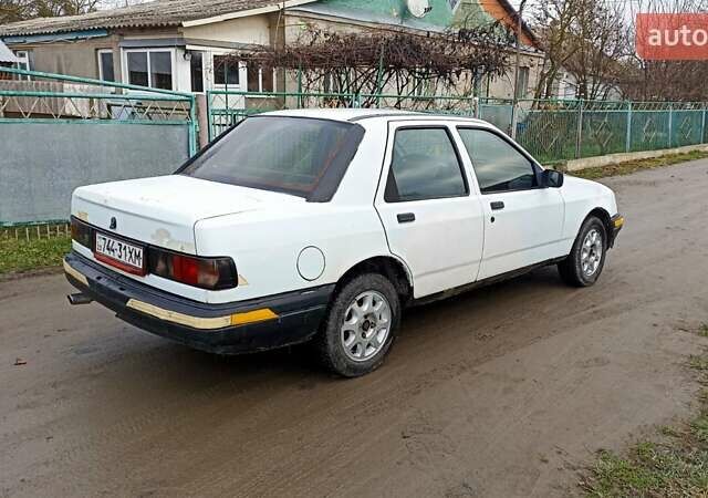 Белый Форд Сиерра, объемом двигателя 2 л и пробегом 300 тыс. км за 590 $, фото 3 на Automoto.ua