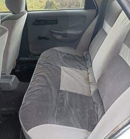 Белый Форд Сиерра, объемом двигателя 2 л и пробегом 300 тыс. км за 590 $, фото 7 на Automoto.ua