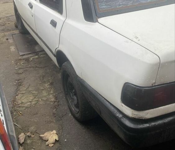 Белый Форд Сиерра, объемом двигателя 2 л и пробегом 222 тыс. км за 750 $, фото 1 на Automoto.ua