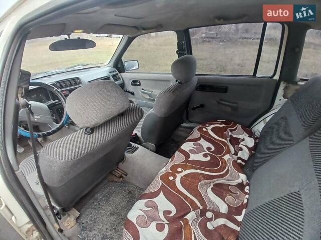 Белый Форд Сиерра, объемом двигателя 2 л и пробегом 300 тыс. км за 650 $, фото 8 на Automoto.ua