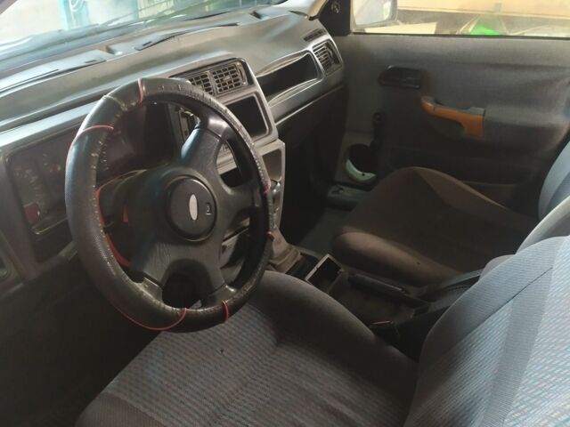 Білий Форд Сієрра, об'ємом двигуна 2 л та пробігом 200 тис. км за 477 $, фото 4 на Automoto.ua