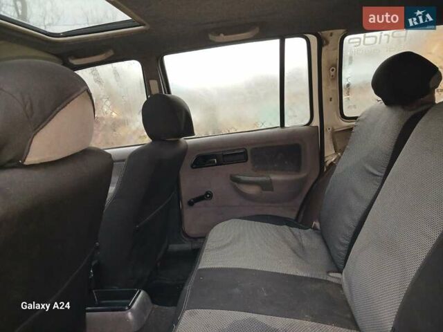 Білий Форд Сієрра, об'ємом двигуна 2 л та пробігом 200 тис. км за 1300 $, фото 6 на Automoto.ua