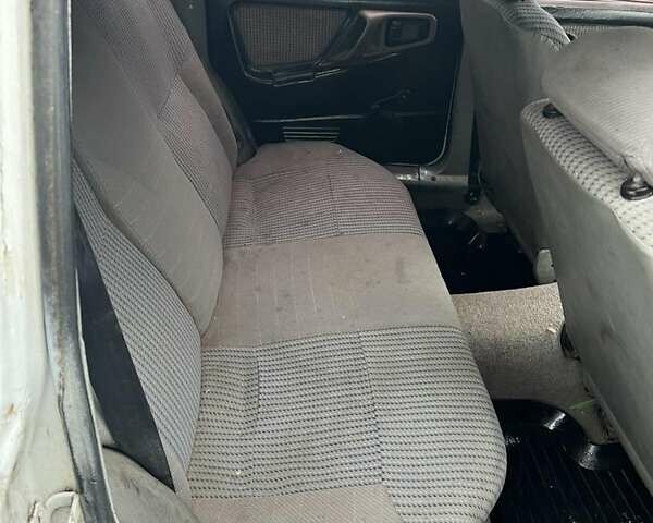 Белый Форд Сиерра, объемом двигателя 1.8 л и пробегом 250 тыс. км за 550 $, фото 6 на Automoto.ua