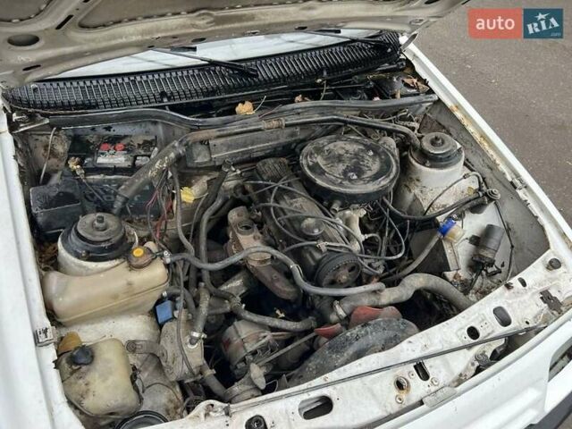 Белый Форд Сиерра, объемом двигателя 1.8 л и пробегом 250 тыс. км за 550 $, фото 3 на Automoto.ua