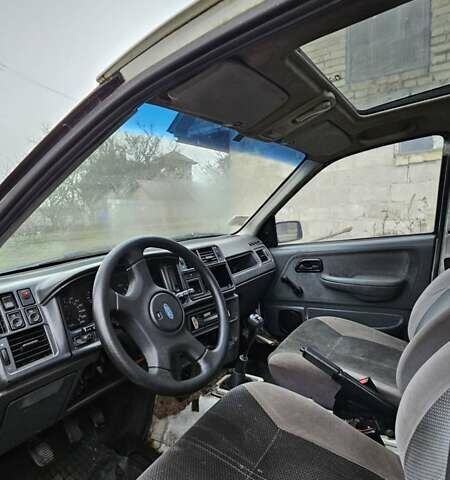 Білий Форд Сієрра, об'ємом двигуна 1.8 л та пробігом 68 тис. км за 1100 $, фото 10 на Automoto.ua